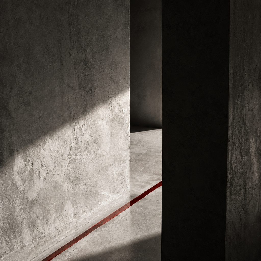 A narrow slot between two concrete walls, a red line running away along the floor.